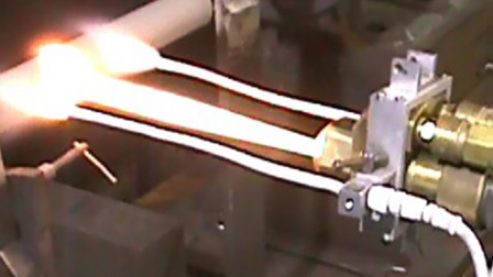 Carbon dioxide cooling jets mounted on a DiamondJet™ HVOF-GF gun.